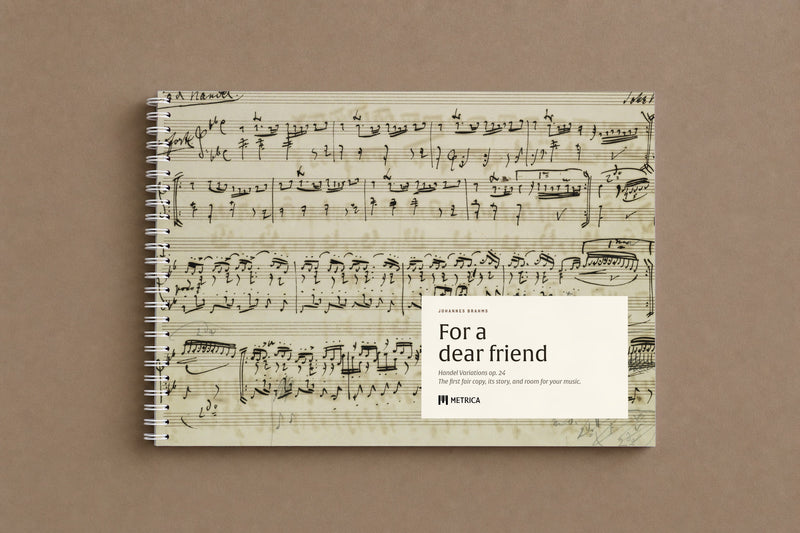Brahms — Handel Variations, Op. 24 — the notebook closed: the manuscript on the cover, white spiral on the left, digitally composed product view