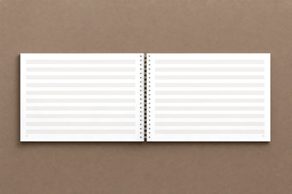 Mozart — Symphony No. 32, K. 318 — open notebook, staff paper: ten staves to a page, ruled like Mozart's, digitally composed product view