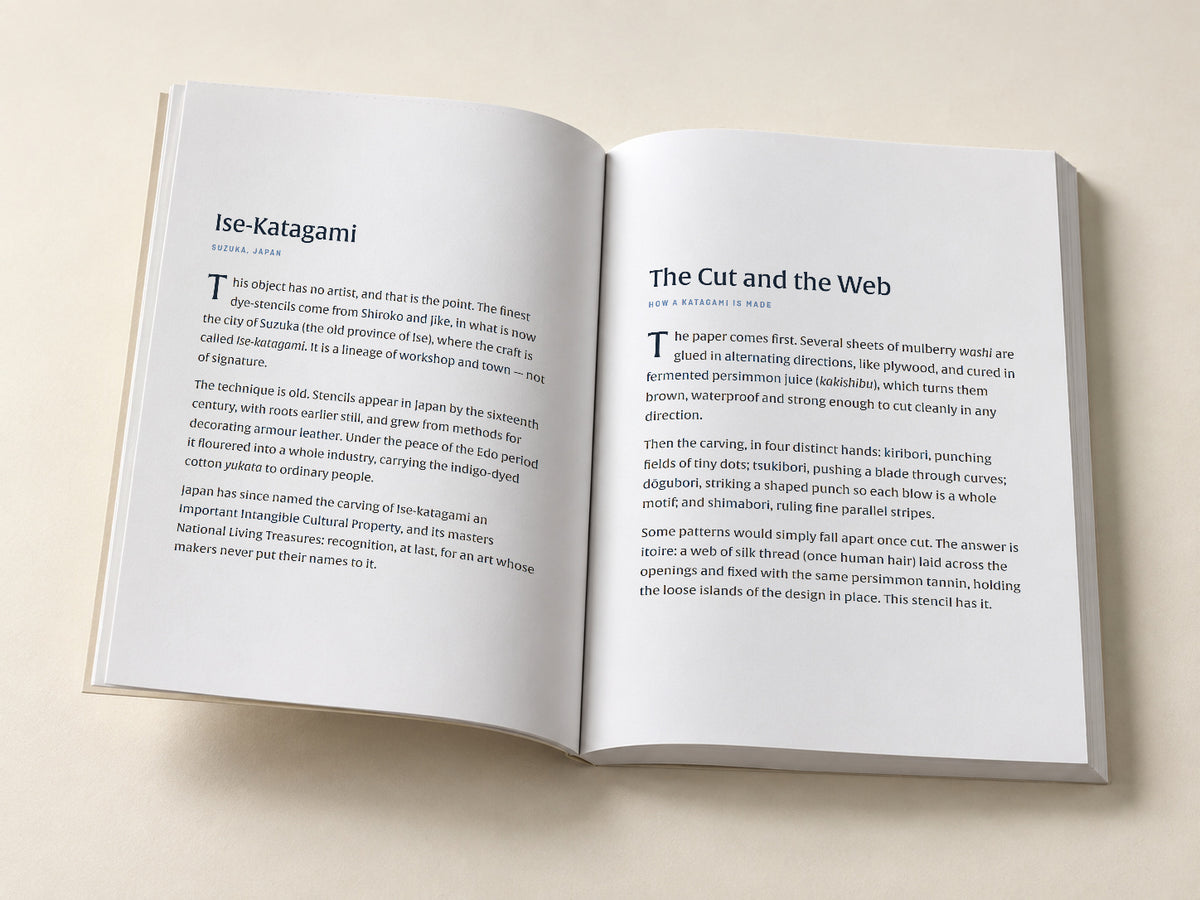 Katagami — Flying Fish — open notebook with the original editorial pages, digitally composed product view